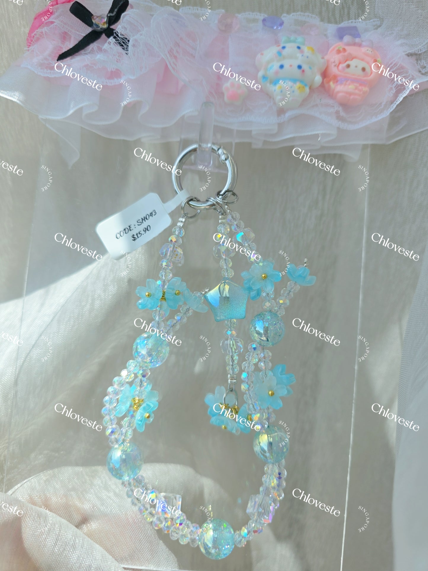 (SH043) Blue flower bead pot with star phone strap