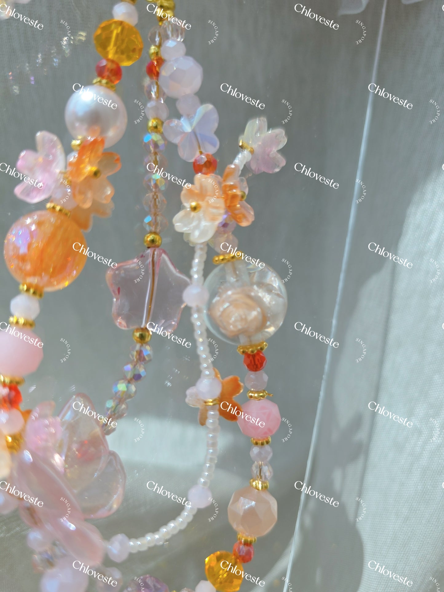 (GH008) Peachy pink red butterfly star with rose bead phone strap