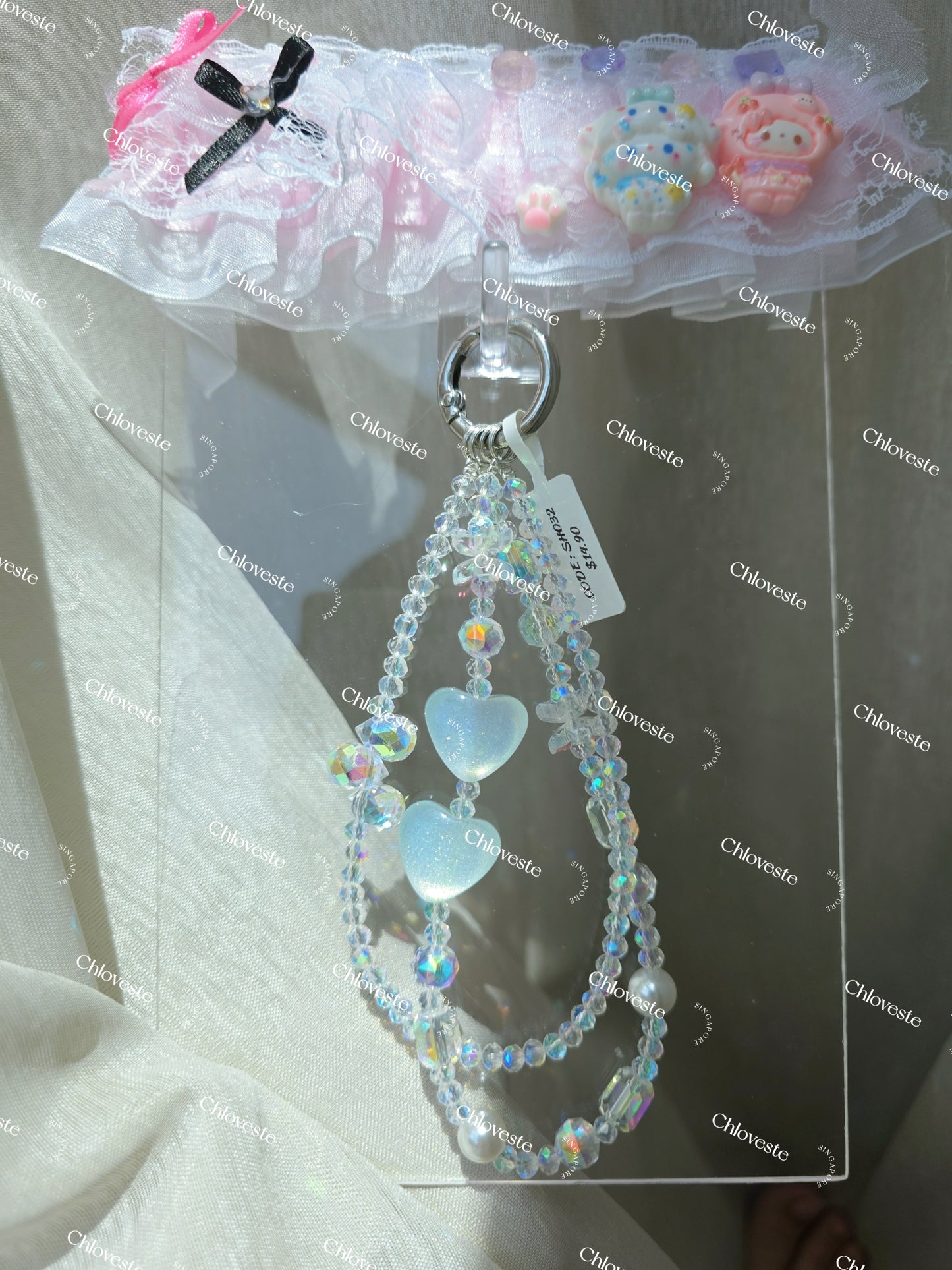 (SH032) Double white cat eye hearts phone strap