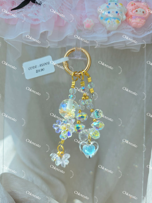 (KG002) Clear blink with flower blue heart keychain